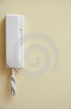 Intercom home hung on wall. An object of home