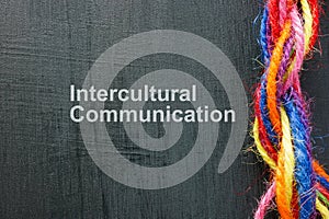 Intercultural communication concept. Multi-colored threads twisted into one rope.