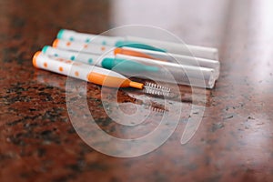 Interdental brushes on a marble plate