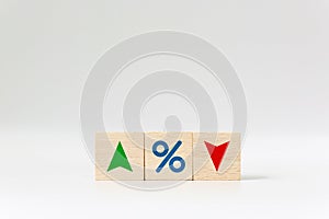 Interest rate financial and mortgage rates concept. Wooden cube block with icon percentage
