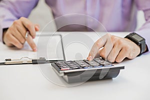 Interest rates documents with calculator photo