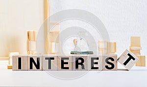 INTEREST word made with building blocks