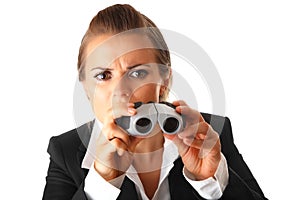 Interested modern business woman with binoculars