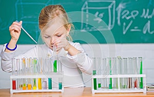 Interesting approach to learn. Future scientist. Explore and investigate. School lesson. Girl cute school pupil play