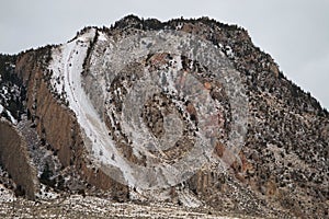 Interesting geologic formation of snow covered mountain in Montana