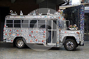 Interesting image of bus, decorated in artist`s vision of whimsy, American Visionary Art Museum, Baltimore, Maryland, 2017