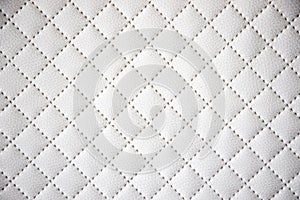 Interesting original white leather background with quilting pattern