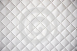 Interesting original white leather background with quilting pattern