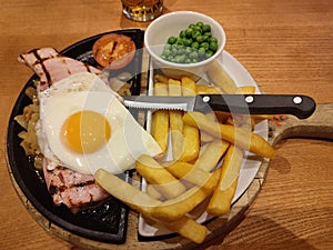 interesting plate with gammon, French fries