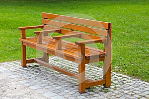 Interesting unusual wooden park bench at a park