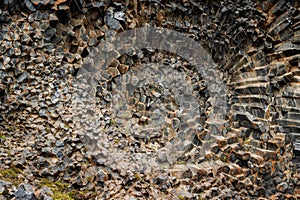 Interesting volcanic rock shapes, basalt column pattern