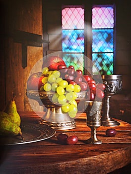 interestingly arranged fruit on the table with an interesting background photo