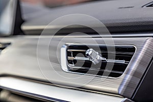 interior air duct on the front panel of a premium car