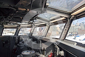 An interior of an aircraft carrier and its cockpit