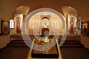 Interior, altar, icons, frescoes, baptismal font, in the old russian traditional orthodox church