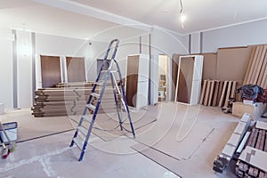 Interior of apartment during construction, remodeling, renovation, extension, restoration and reconstruction - ladde