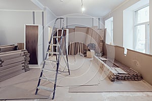 Interior of apartment during construction, remodeling, renovation, extension, restoration and reconstruction - ladde