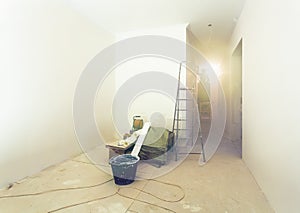 Interior of apartment during construction, remodeling, renovation, extension, restoration and reconstruction - ladde