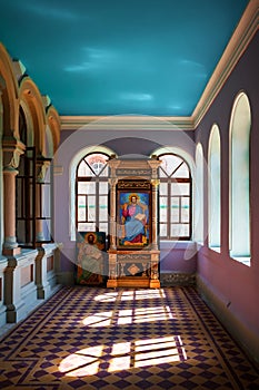 The interior of the Assumption-Bogoroditsky Monastery. Arched windows, rays of light and bright wall colors. Sviyazhsk. Kazan.