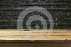 Interior background with retro table and black brick wall