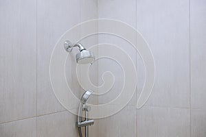 Interior of bathroom with modern shower head in bathroom