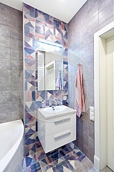 Interior bathroom with tiles in a modern style