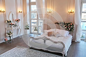 The interior of a beautiful bedroom Suite in bright white.