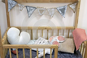 Interior of beautiful vintage children`s room with crib