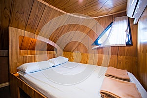 Interior of a bedroom on a liveaboard dive boats