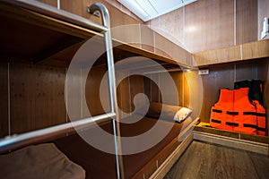 Interior of a bedroom on a liveaboard dive boats