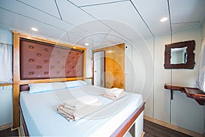 Interior of a bedroom on a liveaboard dive boats