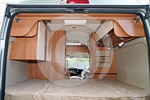 Interior bedroom modern vanlife campervan coach with luxury equipment