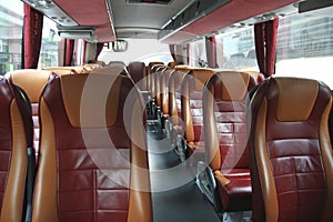 Interior of big coach bus with leather seats