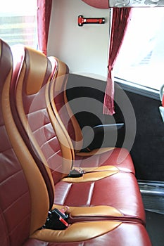 Interior of big coach bus with leather seats