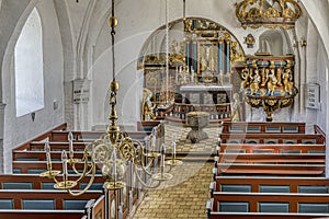 Interior of a biright and colourful danish church