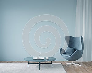 Interior in blue with a stylish chair and a round coffee table