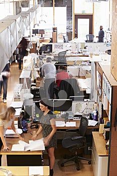 Interior Of Busy Architect's Office With Staff Working