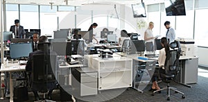 Interior Of Busy Modern Open Plan Office With Staff photo