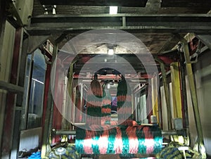 interior of car car wash with cleaning brushes in operation