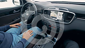 Interior of a car which is moving automatically. Self Driving Autopilot Autonomous Cars