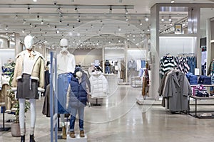 Interior of a casual clothing store for the whole family. Men's, women's and children's fashion