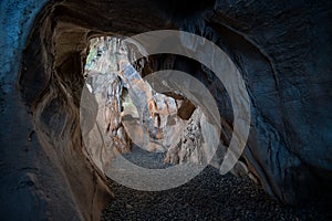 The interior of the cave. Ancient formations of stone. Touristic hiking route. Concept of excursions and attractions. Cuceler photo