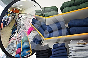 Interior of a clothing store for children with mirror