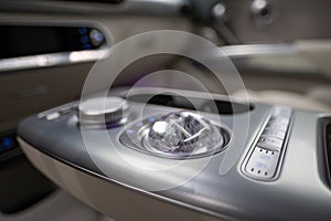 Interior, cockpit Genesis GV60 Electric Car, ergonomic digital panel, instruments physical button switches, joysticks, korean