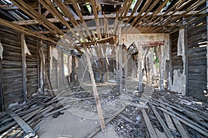 Interior of the completely damaged and abandoned former Glenrio Texas post office photo