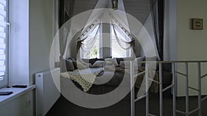 Interior of a contemporary home with spacious hallway, bedroom doors and staircase railing in modern style.