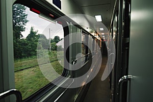 Interior of a corridor of a compartment train. Railway travel concept