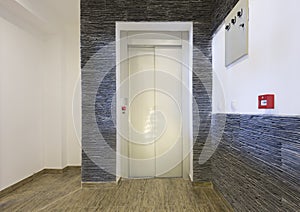 Interior of a corridor with elevator door