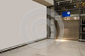 Interior corridor in hall with white wall and elevator in modern office elegant building