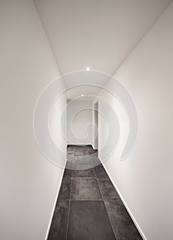 Interior, corridor with tiled floor black